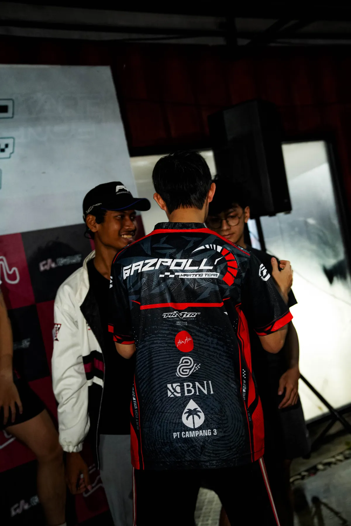 Gazpoll Karting Team race jersey with sponsor logos